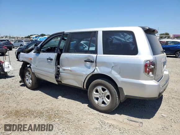 2006 Honda Pilot LX with VIN 5FNYF281X6B043975, listed as a Copart auction lot 66158695 with Not provided miles and Salvage title. Bid and sale history available at DreamBid. Image 2.