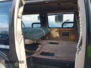 ✅ 1999 GMC Savana Cargo RV Conversion • VIN: 1GDFG15RXX1108208 • Lot: 43745279. Wystawiony na IAAI z przebiegiem 229 448 mil. Bezpłatny archiwum sprzedaży aukcyjnych z USA i szczegółowy raport historii pojazdu na DreamBid. Zdjęcie 8.