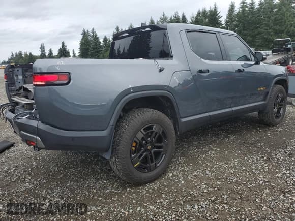 ✅ 2023 Rivian R1T Adventure • VIN: 7FCTGAAA7PN023885 • Lot: 68702645. Listed on Copart with 34,990 mi. Free auction sales archive from the USA and detailed vehicle history report at DreamBid. Image 3.