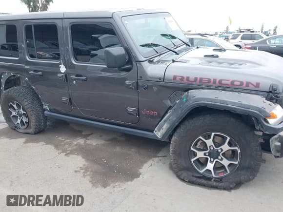 ✅ 2020 Jeep Wrangler Unlimited Rubicon • VIN: 1C4HJXFG1LW233075 • Lot: 42328486. Listed on IAAI with 85,359 mi. Free auction sales archive from the USA and detailed vehicle history report at DreamBid. Image 6.