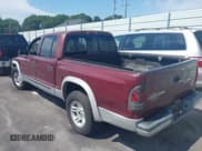 ✅ 2003 Dodge Dakota SLT • VIN: 1D7HL48X13S132234 • Lot: 43087429. Wystawiony na IAAI z przebiegiem 166 002 mil. Bezpłatny archiwum sprzedaży aukcyjnych z USA i szczegółowy raport historii pojazdu na DreamBid. Zdjęcie 3.