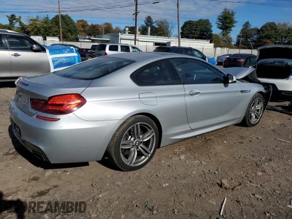 ✅ 2015 BMW 6 Series 650i xDrive • VIN: WBAYM1C51FD325274 • Лот: 82352615. Опубликован ранее на Copart с пробегом 146 468 миль. Бесплатный доступ к архиву аукционных продаж из США и подробный отчёт об истории автомобиля на DreamBid. Изображение 3.