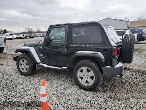 ✅ 2010 Jeep Wrangler Sahara • VIN: 1J4AA5D18AL228503 • Lot: 83669344. Listed on Copart with 117,283 mi. Free auction sales archive from the USA and detailed vehicle history report at DreamBid. Image 2.