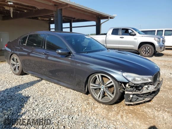 ✅ 2016 BMW 7 Series 750i • VIN: WBA7F0C57GGM20857 • Lot: 61143845. Listed on Copart with 141,313 mi. Free auction sales archive from the USA and detailed vehicle history report at DreamBid. Image 4.
