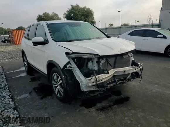 ✅ 2017 Honda Pilot EX-L • VIN: 5FNYF5H65HB026680 • Lot: 92810595. Listed on Copart with 84,919 mi. Free auction sales archive from the USA and detailed vehicle history report at DreamBid. Image 15.