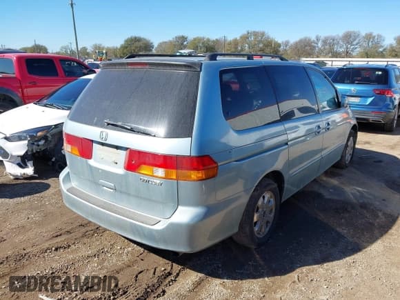 ✅ 2003 Honda Odyssey EX • VIN: 5FNRL18683B074057 • Lot: 43791827. Listed on IAAI with 326,201 mi. Free auction sales archive from the USA and detailed vehicle history report at DreamBid. Image 4.