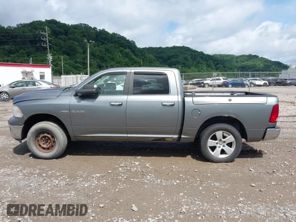 ✅ 2009 Dodge 1500 Laramie • VIN: 1D3HV13T69J527085 • Lot: 42557525. Wystawiony na IAAI z przebiegiem 100 750 mil. Bezpłatny archiwum sprzedaży aukcyjnych z USA i szczegółowy raport historii pojazdu na DreamBid. Zdjęcie 14.