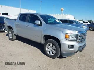 ✅ 2016 GMC Canyon 2WD SLE • VIN: 1GTG5CE30G1219887 • Lot: 43607076. Listed on IAAI with 147,453 mi. Free auction sales archive from the USA and detailed vehicle history report at DreamBid. Image 1.
