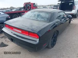 ✅ 2013 Dodge Challenger SXT • VIN: 2C3CDYAG5DH500642 • Lot: 41243016. Wystawiony na IAAI z przebiegiem 199 136 mil. Bezpłatny archiwum sprzedaży aukcyjnych z USA i szczegółowy raport historii pojazdu na DreamBid. Zdjęcie 4.