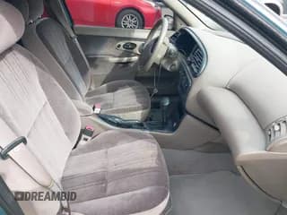 ✅ 1997 Ford Contour LX • VIN: 1FALP6533VK156310 • Лот: 41567292. Опубликован ранее на IAAI с пробегом 79 619 миль. Бесплатный доступ к архиву аукционных продаж из США и подробный отчёт об истории автомобиля на DreamBid. Изображение 5.