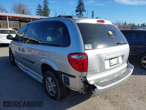 ✅ 2003 Dodge Caravan EX • VIN: 2D4GP74L83R157134 • Lot: 41698861. Listed on IAAI with 155,818 mi. Free auction sales archive from the USA and detailed vehicle history report at DreamBid. Image 3.