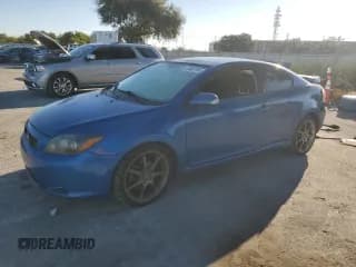 ✅ 2010 Scion tC • VIN: JTKDE3B75A0314431 • Lot: 92687995. Wystawiony na Copart z przebiegiem 131 097 mil. Bezpłatny archiwum sprzedaży aukcyjnych z USA i szczegółowy raport historii pojazdu na DreamBid. Zdjęcie 1.