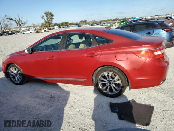 ✅ 2012 Hyundai Azera • VIN: KMHFG4JG5CA183172 • Лот: 90432795. Опубликован ранее на Copart с пробегом 82 676 миль. Бесплатный доступ к архиву аукционных продаж из США и подробный отчёт об истории автомобиля на DreamBid. Изображение 2.