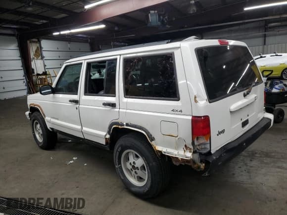 ✅ 1997 Jeep Cherokee Country • VIN: 1J4FJ78S0VL587323 • Lot: 89295355. Listed on Copart with 205,432 mi. Free auction sales archive from the USA and detailed vehicle history report at DreamBid. Image 2.