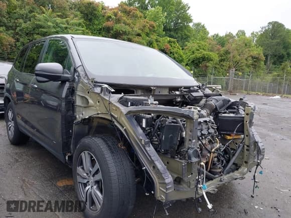 ✅ 2017 Honda Pilot EX-L • VIN: 5FNYF5H77HB033090 • Lot: 42359412. Listed on IAAI with 131,032 mi. Free auction sales archive from the USA and detailed vehicle history report at DreamBid. Image 1.