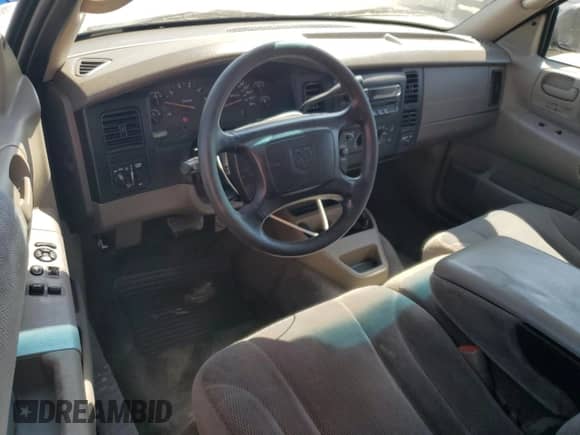 2002 Dodge Dakota Sport z VIN 1B7GL32XX2S588725, wystawiony jako Copart lot #65541345 z przebiegiem 205 568 mil mil oraz Szkoda całkowita • Salvage title. Historia ofert i sprzedaży dostępna na DreamBid. Obrazek 8.