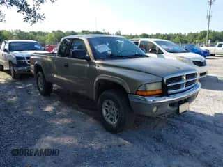 2002 Dodge Dakota SLT с VIN 1B7GG42N12S515140, выставлен на аукционе IAAI как лот 42309633 с пробегом 215 774 миль миль и . История ставок и продаж доступна на DreamBid. Изображение 1.
