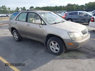 ✅ 2001 Lexus RX 300 • VIN: JTJHF10U910165733 • Lot: 43356064. Wystawiony na IAAI z przebiegiem 300 451 mil. Bezpłatny archiwum sprzedaży aukcyjnych z USA i szczegółowy raport historii pojazdu na DreamBid. Zdjęcie 1.