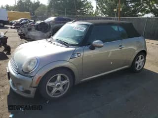 ✅ 2010 MINI Convertible • VIN: WMWMR3C54ATU98720 • Lot: 66901934. Listed on Copart with 142,150 mi. Free auction sales archive from the USA and detailed vehicle history report at DreamBid. Image 1.