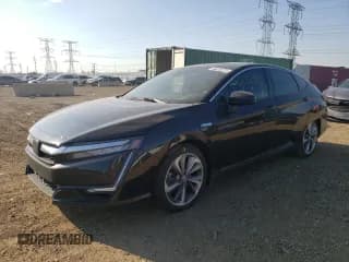 ✅ 2018 Honda Clarity Touring • VIN: JHMZC5F39JC019173 • Лот: 66970772. Опубликован ранее на Copart с пробегом 28 674 миль. Бесплатный доступ к архиву аукционных продаж из США и подробный отчёт об истории автомобиля на DreamBid. Изображение 2.