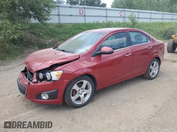 2012 Chevrolet Sonic LTZ with VIN 1G1JE5SH5C4152268, listed as a Copart auction lot 61047295 with 137,502 mi miles and Salvage title. Bid and sale history available at DreamBid. Image 1.