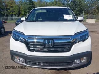 ✅ 2020 Honda Ridgeline RTL-E • VIN: 5FPYK3F70LB000550 • Lot: 43067441. Listed on IAAI with 43,131 mi. Free auction sales archive from the USA and detailed vehicle history report at DreamBid. Image 6.