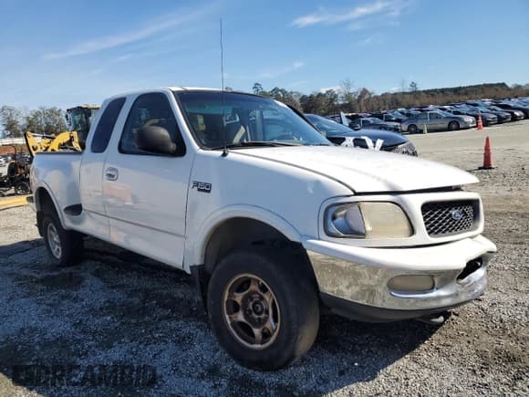 ✅ 1998 Ford F-150 XL • VIN: 1FTZX08W6WKA55383 • Lot: 80040264. Listed on Copart with 180,786 mi. Free auction sales archive from the USA and detailed vehicle history report at DreamBid. Image 4.
