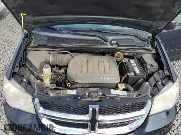 ✅ 2014 Dodge Grand Caravan SE • VIN: 2C4RDGBG1ER389808 • Lot: 68566985. Listed on Copart with 172,800 mi. Free auction sales archive from the USA and detailed vehicle history report at DreamBid. Image 12.