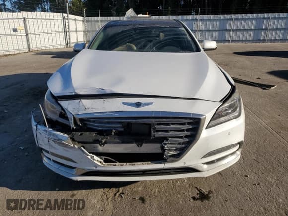 ✅ 2018 Genesis G80 3.8L • VIN: KMHGN4JE6JU243576 • Лот: 82532505. Опубликован ранее на Copart с пробегом 123 225 миль. Бесплатный доступ к архиву аукционных продаж из США и подробный отчёт об истории автомобиля на DreamBid. Изображение 5.