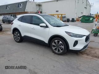 ✅ 2024 Ford Escape Platinum • VIN: 1FMCU9JA4RUB41992 • Lot: 42976165. Listed on IAAI with 9,501 mi. Free auction sales archive from the USA and detailed vehicle history report at DreamBid. Image 1.