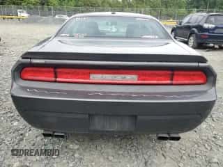 2013 Dodge Challenger R/T Plus z VIN 2C3CDYBT9DH629107, wystawiony jako Copart lot #62844584 z przebiegiem 121 108 mil mil oraz Szkoda całkowita • Salvage title. Historia ofert i sprzedaży dostępna na DreamBid. Obrazek 6.