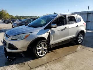 ✅ 2014 Ford Escape Titanium • VIN: 1FMCU0JX7EUB62510 • Лот: 86103135. Опубликован ранее на Copart с пробегом 166 323 миль. Бесплатный доступ к архиву аукционных продаж из США и подробный отчёт об истории автомобиля на DreamBid. Изображение 1.