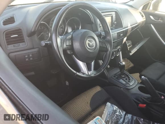 ✅ 2014 Mazda CX-5 Touring • VIN: JM3KE4CY5E0306659 • Lot: 80895895. Wystawiony na Copart z przebiegiem 140 340 mil. Bezpłatny archiwum sprzedaży aukcyjnych z USA i szczegółowy raport historii pojazdu na DreamBid. Zdjęcie 8.