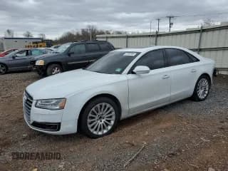 ✅ 2015 Audi A8 • VIN: WAUJGAFD6FN022822 • Lot: 47642595. Wystawiony na Copart z przebiegiem 89 988 mil. Bezpłatny archiwum sprzedaży aukcyjnych z USA i szczegółowy raport historii pojazdu na DreamBid. Zdjęcie 1.