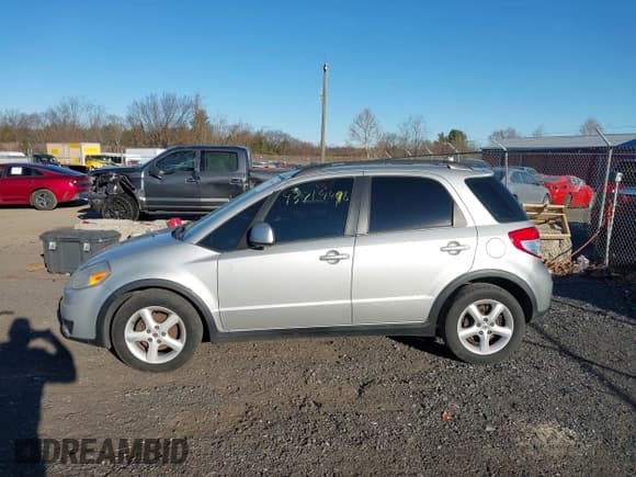 ✅ 2009 Suzuki SX4 AWD • VIN: JS2YB413896200346 • Lot: 43714498. Wystawiony na IAAI z przebiegiem 227 017 mil. Bezpłatny archiwum sprzedaży aukcyjnych z USA i szczegółowy raport historii pojazdu na DreamBid. Zdjęcie 14.