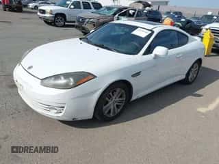 ✅ 2007 Hyundai Tiburon GS • VIN: KMHHM66D47U254751 • Лот: 43124714. Опубликован ранее на IAAI с пробегом 206 292 миль. Бесплатный доступ к архиву аукционных продаж из США и подробный отчёт об истории автомобиля на DreamBid. Изображение 2.