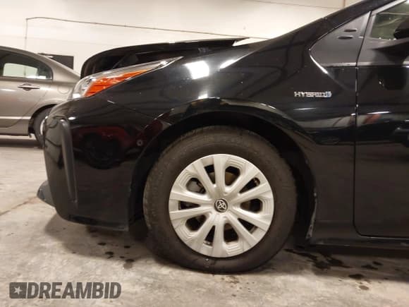 ✅ 2022 Toyota Prius L Eco • VIN: JTDKAMFU6N3189315 • Lot: 43616635. Listed on IAAI with 67,156 mi. Free auction sales archive from the USA and detailed vehicle history report at DreamBid. Image 19.