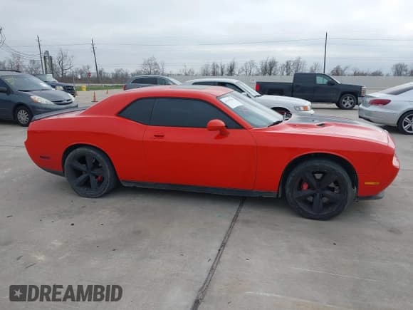 ✅ 2008 Dodge Challenger SRT-8 • VIN: 2B3LJ74W98H302509 • Lot: 41557503. Listed on IAAI with 125,000 mi. Free auction sales archive from the USA and detailed vehicle history report at DreamBid. Image 13.