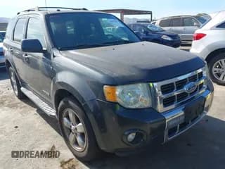 ✅ 2008 Ford Escape Limited • VIN: 1FMCU04138KA60371 • Lot: 43657907. Listed on IAAI with 138,741 mi. Free auction sales archive from the USA and detailed vehicle history report at DreamBid. Image 1.
