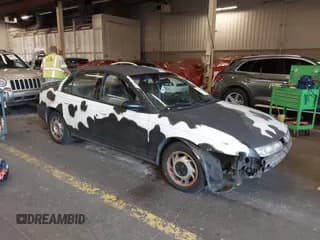 ✅ 1997 Saturn SL • VIN: 1G8ZK5271VZ117222 • Lot: 43566473. Listed on IAAI with 212,293 mi. Free auction sales archive from the USA and detailed vehicle history report at DreamBid. Image 1.