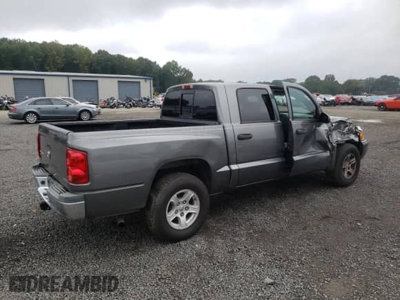 2006 Dodge Dakota SLT z VIN 1D7HE48K36S656505, wystawiony jako Copart lot #72613124 z przebiegiem 71 075 mil mil oraz Szkoda całkowita • Salvage title. Historia ofert i sprzedaży dostępna na DreamBid. Obrazek 3.