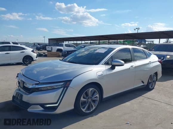 ✅ 2018 Honda Clarity • VIN: JHMZC5F19JC008589 • Lot: 43364573. Listed on IAAI with 111,762 mi. Free auction sales archive from the USA and detailed vehicle history report at DreamBid. Image 2.