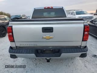 ✅ 2018 Chevrolet Silverado 1500 Custom • VIN: 3GCPCPEC6JG188408 • Лот: 71049534. Опубликован ранее на Copart с пробегом 73 987 миль. Бесплатный доступ к архиву аукционных продаж из США и подробный отчёт об истории автомобиля на DreamBid. Изображение 6.