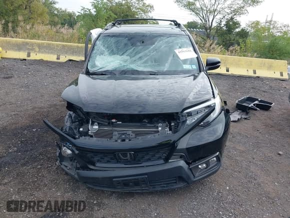 ✅ 2020 Honda Passport EX-L • VIN: 5FNYF8H54LB000055 • Lot: 43319655. Listed on IAAI with 14,502 mi. Free auction sales archive from the USA and detailed vehicle history report at DreamBid. Image 11.