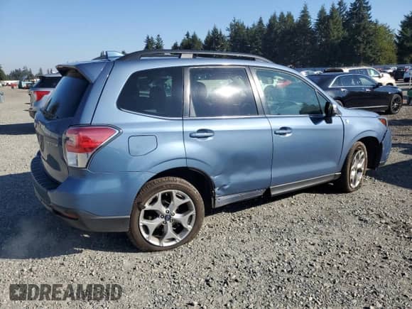 2018 Subaru Forester Touring with VIN JF2SJAWC4JH533194, listed as a Copart auction lot 85264165 with 115,027 mi miles and Salvage title. Bid and sale history available at DreamBid. Image 3.