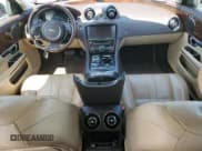 ✅ 2014 Jaguar XJ • VIN: SAJWA1CZ3E8V69877 • Лот: 51520405. Опубликован ранее на Copart с пробегом 57 567 миль. Бесплатный доступ к архиву аукционных продаж из США и подробный отчёт об истории автомобиля на DreamBid. Изображение 8.