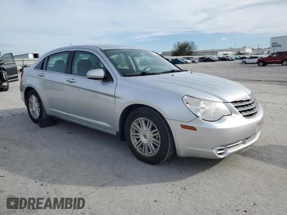 ✅ 2009 Chrysler Sebring Touring • VIN: 1C3LC56B39N549528 • Лот: 91129855. Опубликован ранее на Copart с пробегом 192 610 миль. Бесплатный доступ к архиву аукционных продаж из США и подробный отчёт об истории автомобиля на DreamBid. Изображение 4.