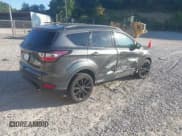 ✅ 2017 Ford Escape SE • VIN: 1FMCU9G94HUB76155 • Lot: 43086492. Listed on IAAI with 119,554 mi. Free auction sales archive from the USA and detailed vehicle history report at DreamBid. Image 4.