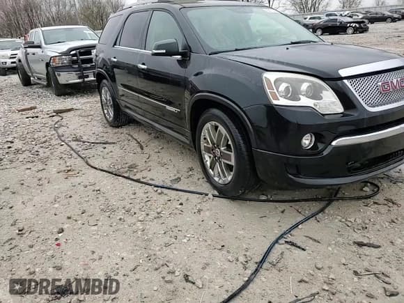 ✅ 2012 GMC Acadia Denali • VIN: 1GKKVTED4CJ142166 • Лот: 53075525. Опубликован ранее на Copart с пробегом 161 365 миль. Бесплатный доступ к архиву аукционных продаж из США и подробный отчёт об истории автомобиля на DreamBid. Изображение 14.
