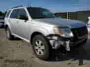 2011 Mercury Mariner with VIN 4M2CN8B78BKJ02364, listed as a Copart auction lot 80027665 with 141,319 mi miles and Salvage title. Bid and sale history available at DreamBid. Image 4.